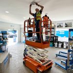 10ft scissor lift being operated for lighting installations.